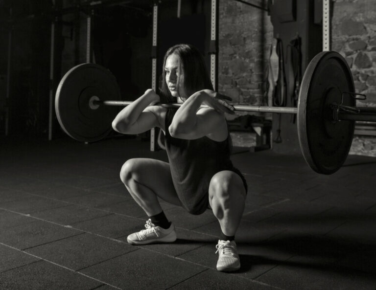 Female,Athlete,Practicing,Front,Squats